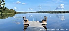 Two benches on a lake river side